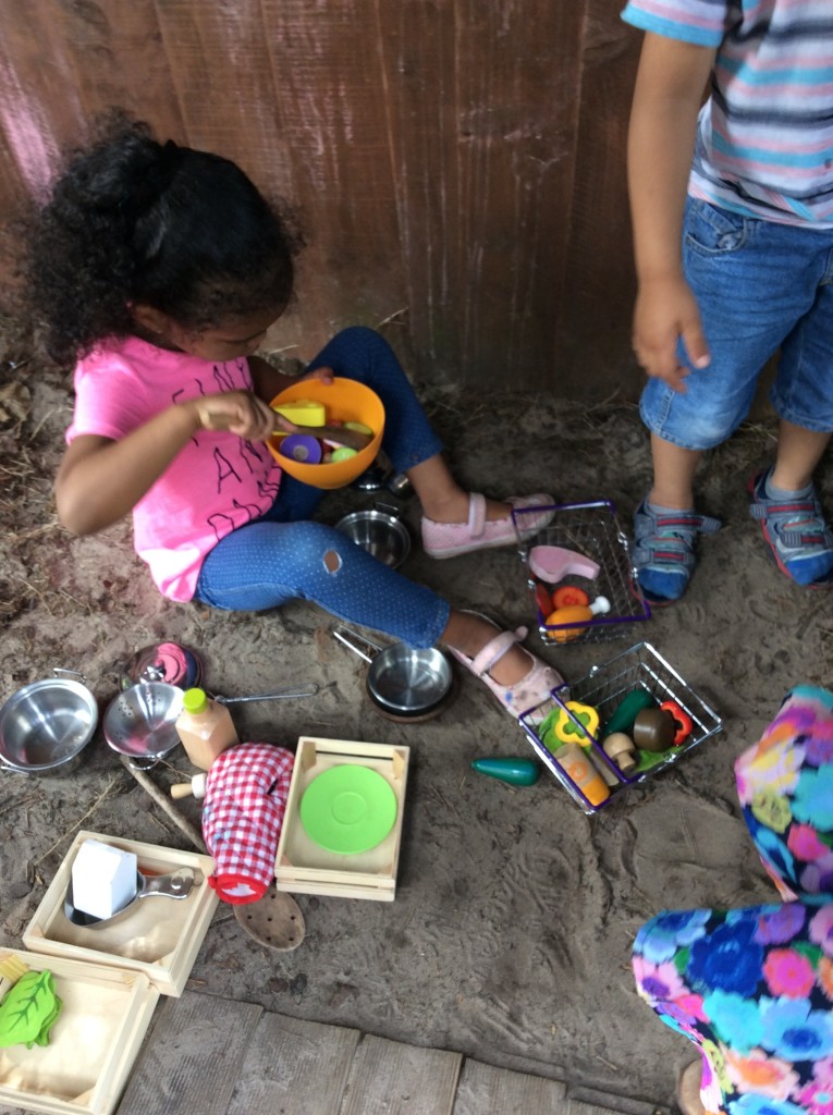 Preparing a picnic in our nursery's Den.