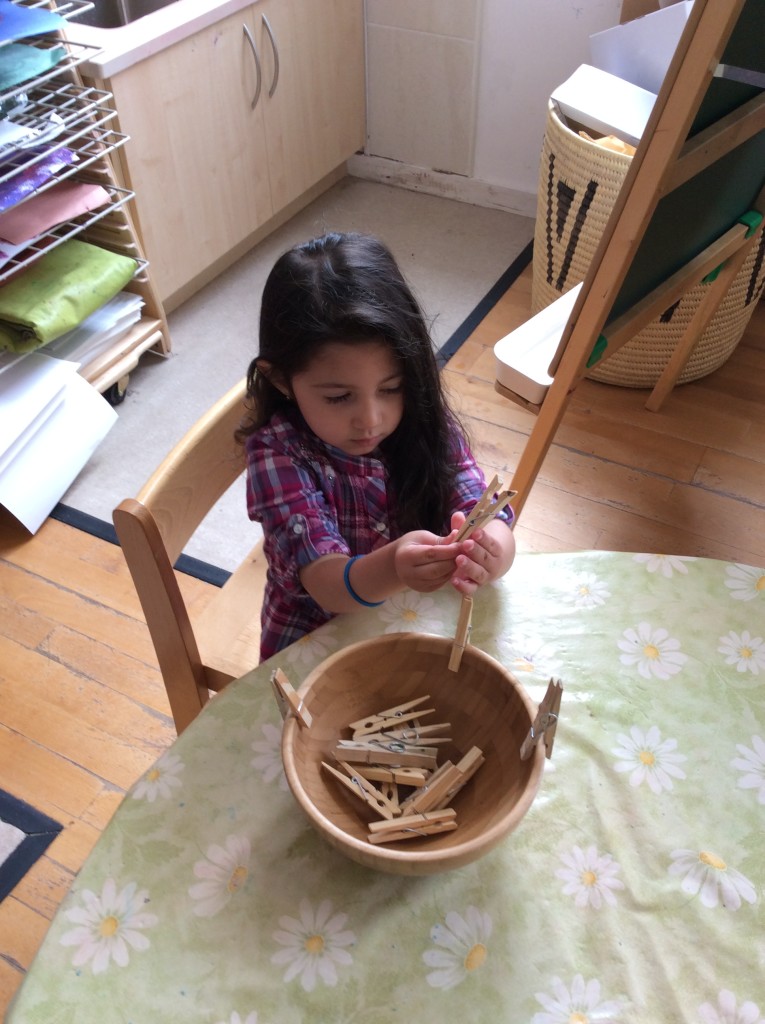 Pegging. Strengthening finger muscles in preparation for writing.
