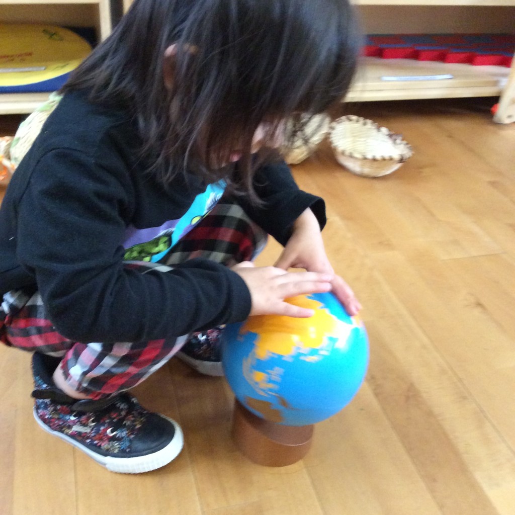 Finding the United Kingdom on the Continent Globe.