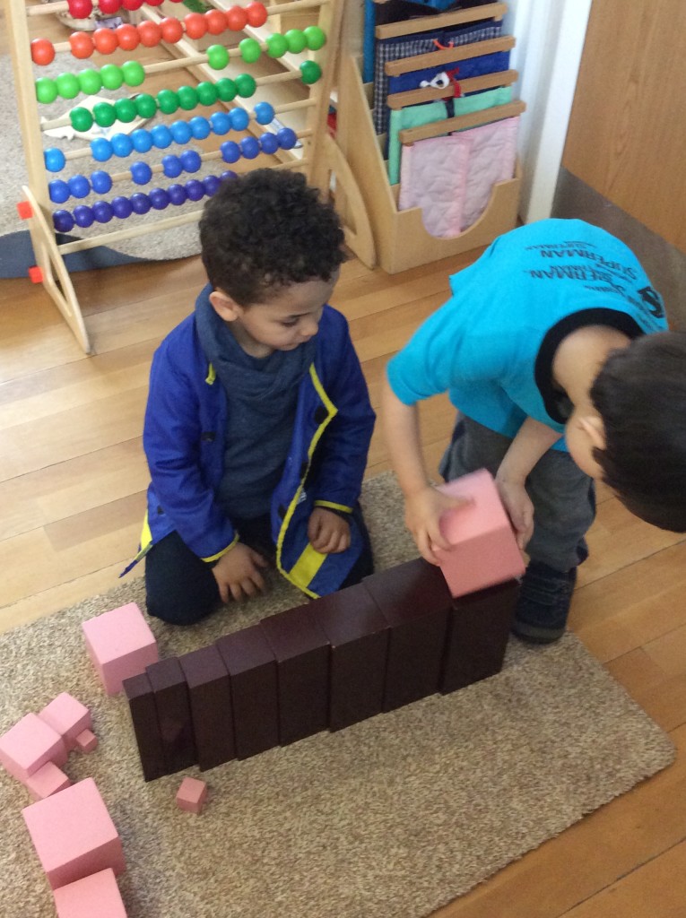 Matching the pink tower blocks with the broad stair blocks.