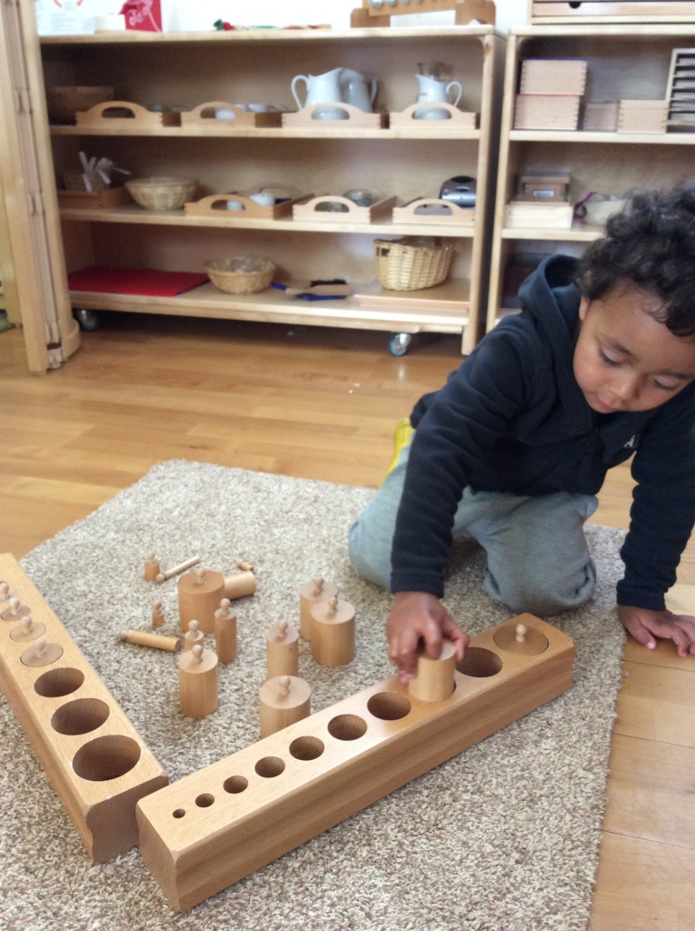 Working with two sets of knobbed cylinder blocks. Hand eye coordination/ logic and maths skills/refinement of fine motor skills and writing practice.